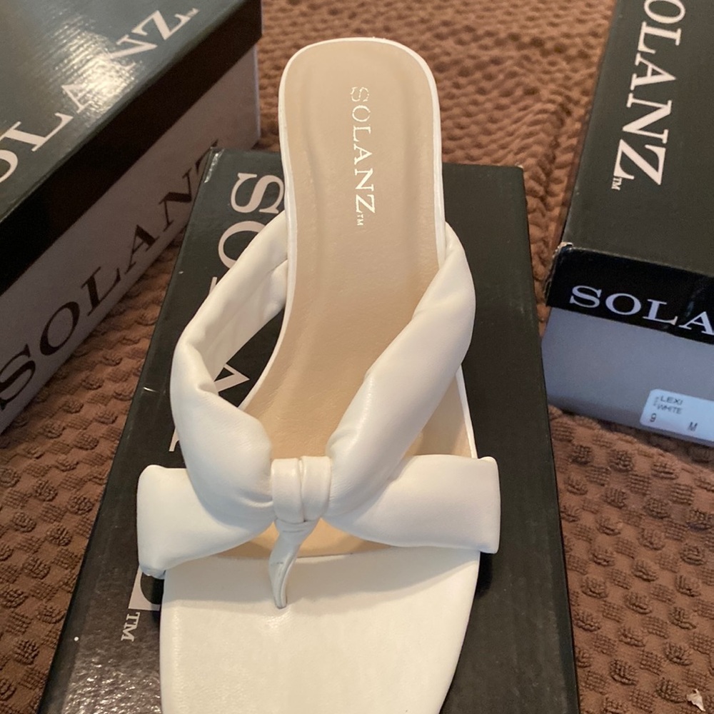 Brand new sandals. With box and tags.
